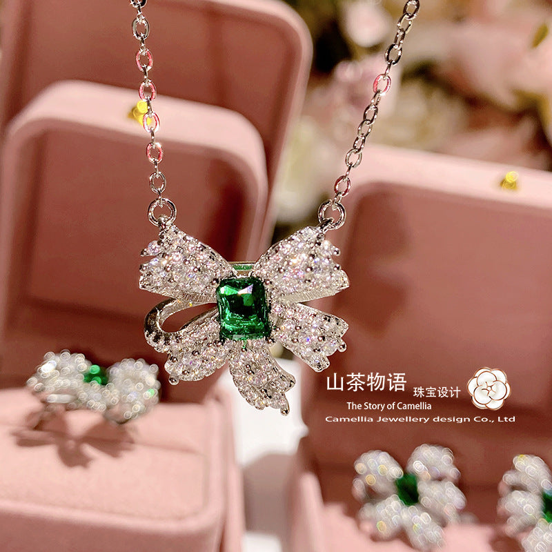 Camellia古风仙气设计蝴蝶结套装女镀金仿托帕浅海蓝戒指耳钉项链