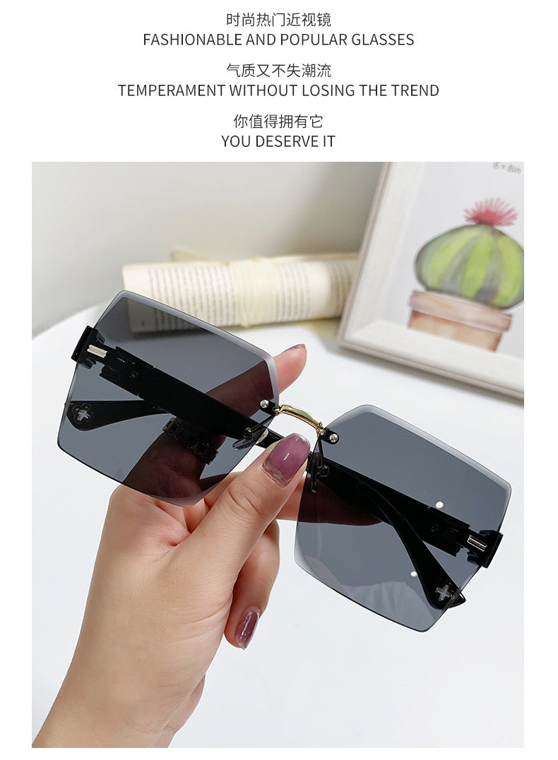 Women's fashion glasses 2022欧美潮流跨境无框切边连体式太阳镜男女个性街拍走秀时尚墨镜