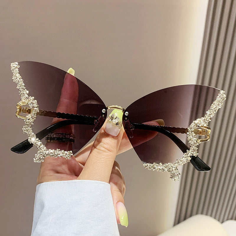 Women's fashion glasses 新款跨境大框蝴蝶镶钻无框太阳镜女ins时尚个性拍照墨镜夸张舞会