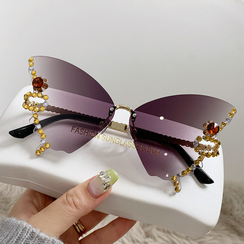 Women's fashion glasses 跨境热销个性无框切边蝴蝶形状镶钻太阳镜高级感时尚走秀搞怪墨镜