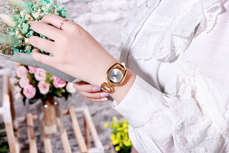 Fashion women's watchNew Cross-Border New Women's Bracelet Watch Douyin Online Influencer Same Watch Fashion Simple Temperament Hollow Sheet Women