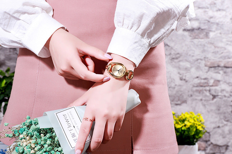 Fashion women's watchNew Cross-Border New Women's Bracelet Watch Douyin Online Influencer Same Watch Fashion Simple Temperament Hollow Sheet Women