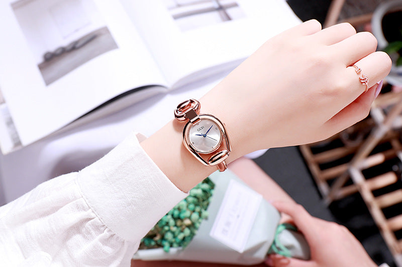 Fashion women's watchNew Cross-Border New Women's Bracelet Watch Douyin Online Influencer Same Watch Fashion Simple Temperament Hollow Sheet Women
