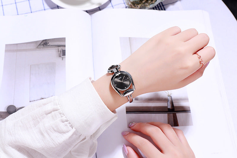 Fashion women's watchNew Cross-Border New Women's Bracelet Watch Douyin Online Influencer Same Watch Fashion Simple Temperament Hollow Sheet Women