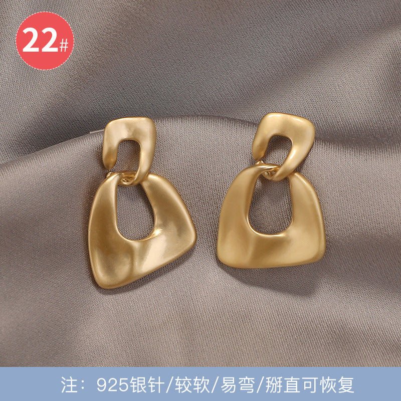 925银针新款猫眼石蝴蝶结耳环女韩国网红个性耳钉长款显脸瘦耳饰