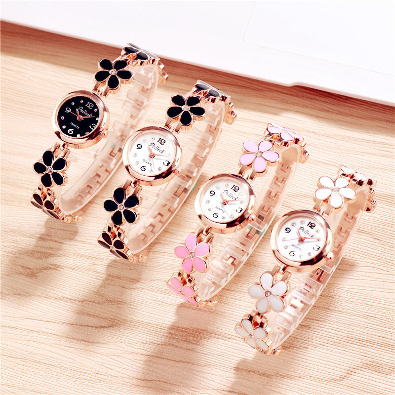 Fashion women's watchPollock Little Daisy Fashion Watch New Plum Blossom Women's Student Women's European and American Brand Electronic Watch