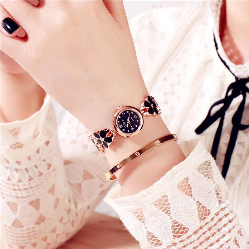 Fashion women's watchPollock Little Daisy Fashion Watch New Plum Blossom Women's Student Women's European and American Brand Electronic Watch