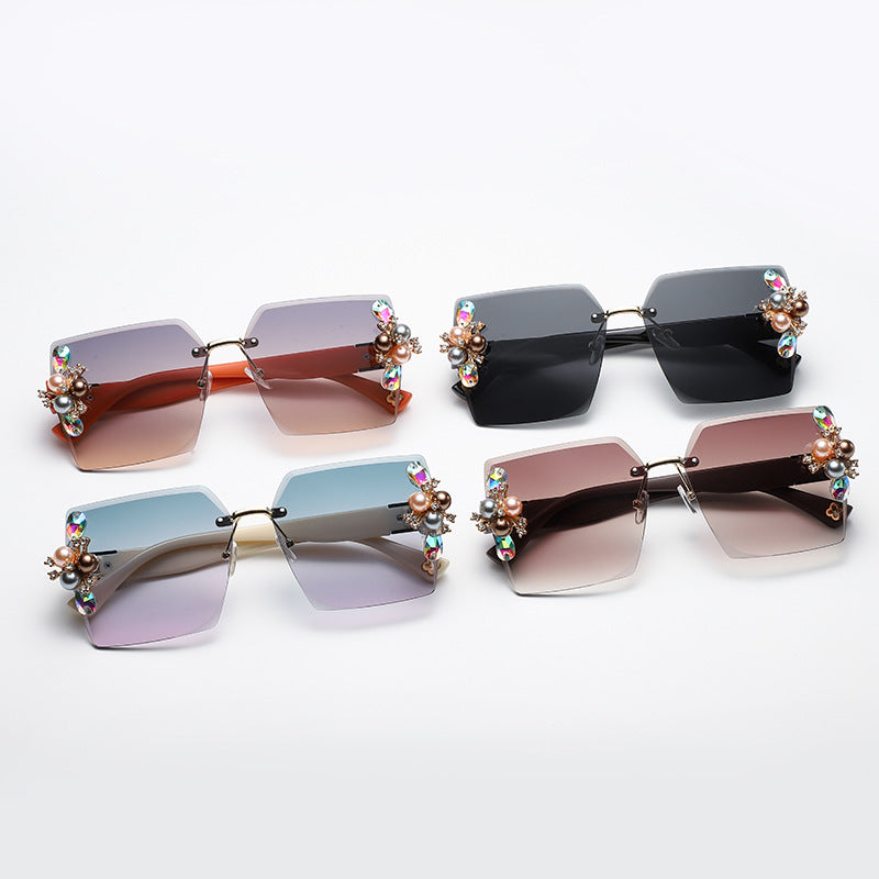Women's fashion glasses 2023跨境无框切边镶珍珠太阳镜女防紫外线墨镜夏季防晒高级感显瘦