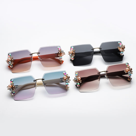 Women's fashion glasses 2023跨境无框切边镶珍珠太阳镜女防紫外线墨镜夏季防晒高级感显瘦