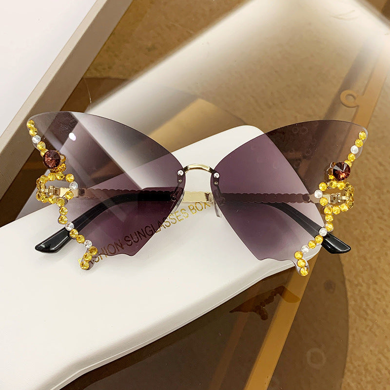 Women's fashion glasses 跨境2023新款蝴蝶形状镶钻无框太阳镜女欧美时尚个性夸张墨镜舞会