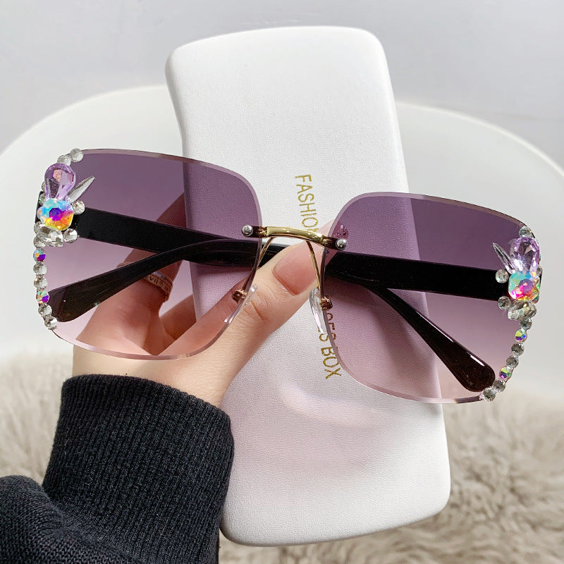 Women's fashion glasses 2023跨境欧美无框切边女士镶钻太阳镜时尚大框遮阳防紫外线墨镜批
