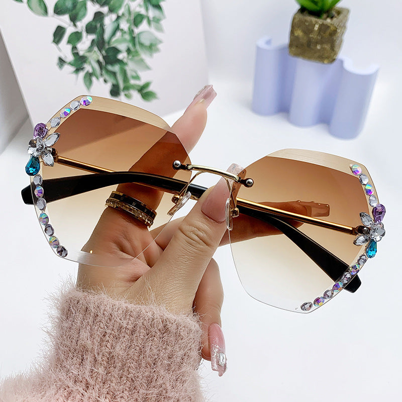 Women's fashion glasses 跨境新款水钻墨镜女显瘦无框切边太阳镜网红潮款防紫外线韩版眼镜