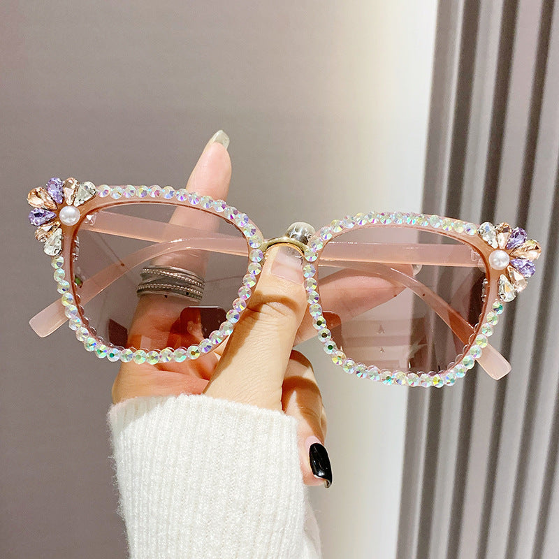 Women's fashion glasses 跨境新款镶钻猫眼太阳镜个性金属鼻梁水钻眼镜欧美街拍墨镜批发