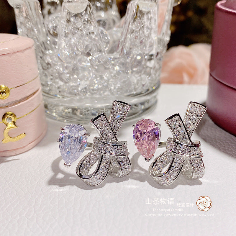 Camellia糖果粉水滴宝石花戒指 精工镀18K 蝴蝶结微镶5A粉锆指环