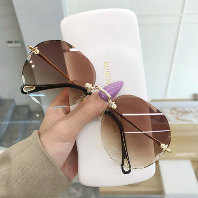 Women's fashion glasses年新款无框太阳眼镜女防紫外线高级感墨镜潮女圆脸大脸显瘦夏