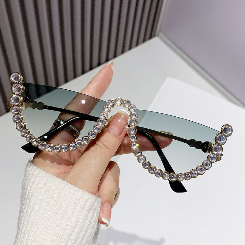 Women's fashion glasses 欧美镶钻大框架跨境水钻墨镜女异形波浪切边眼镜防晒显瘦太阳镜