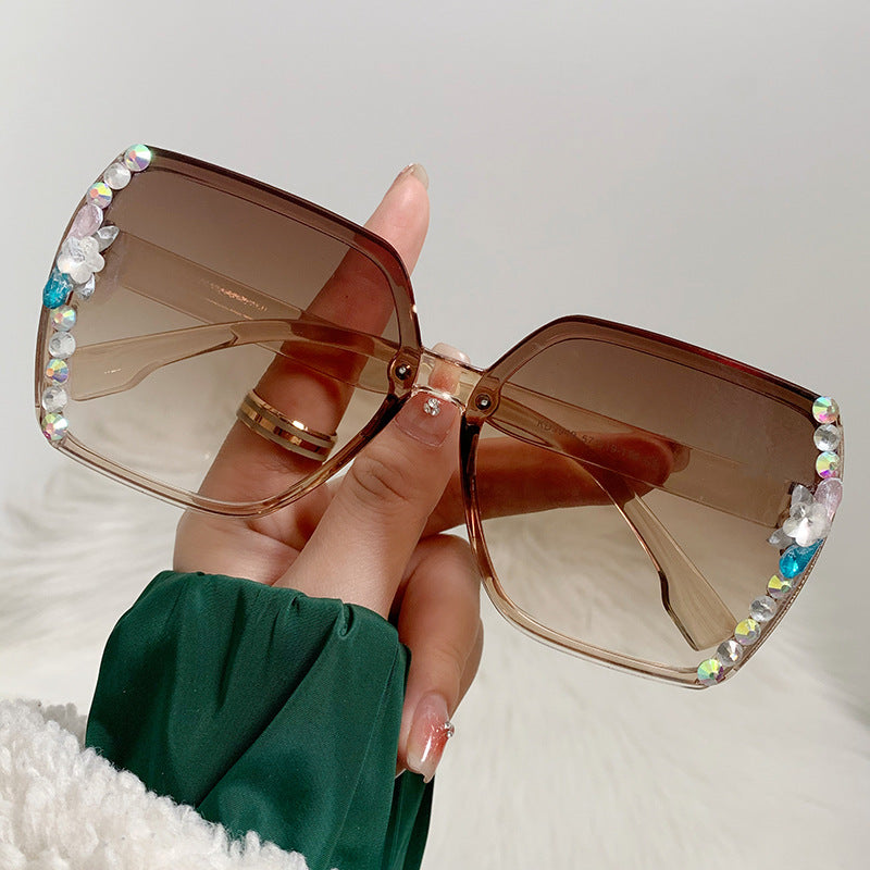Women's fashion glasses 镶钻墨镜女款韩版潮无框水晶切边太阳眼镜女士防紫外线镶钻太阳镜