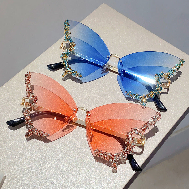 Women's fashion glasses 欧美跨境新款蝴蝶镶碎钻无边框太阳镜复古时尚个性穿搭高级感墨镜