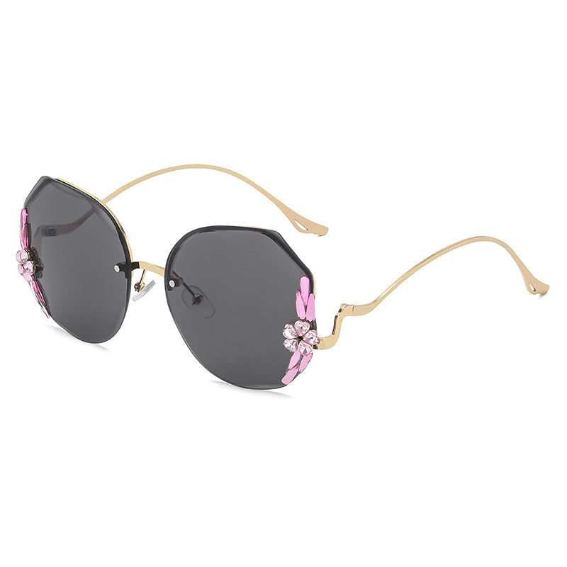 Women's fashion glasses 镶钻墨镜女夏潮无框钻石切边防紫外线太阳镜时尚优雅圆脸显瘦眼镜
