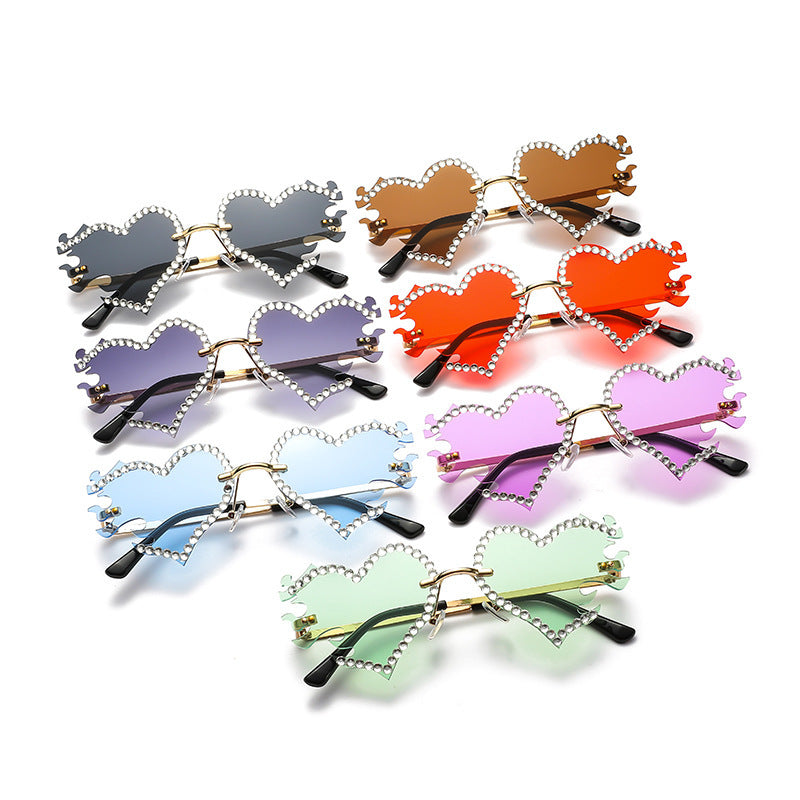 Women's fashion glasses 欧美墨镜太阳镜爱心个性街拍墨镜女无框时尚太阳眼镜批发