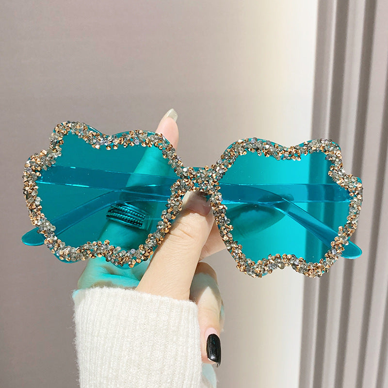 Women's fashion glasses 跨境镶钻透明果冻色苹果太阳镜男女士桃心墨镜欧形连体苹果眼镜