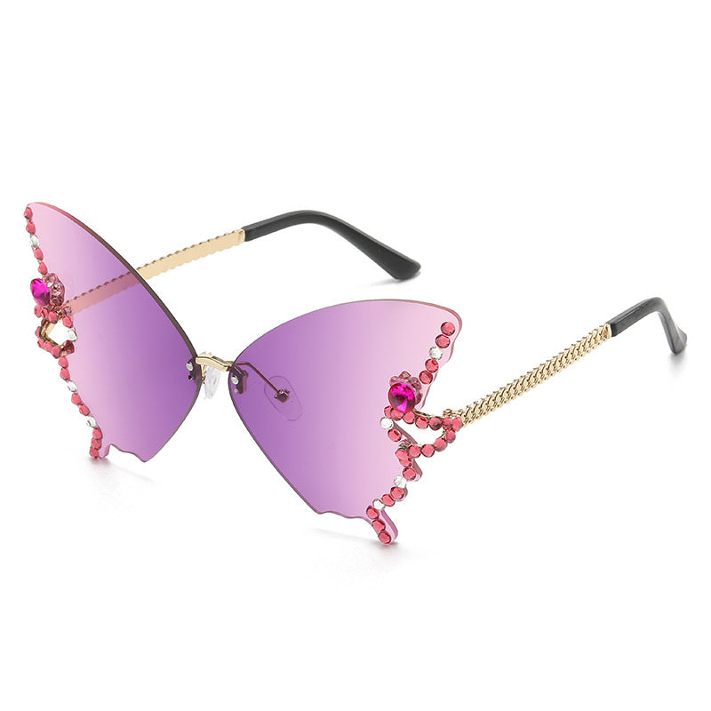 Women's fashion glasses 跨境2023新款蝴蝶形状镶钻无框太阳镜女欧美时尚个性夸张墨镜舞会