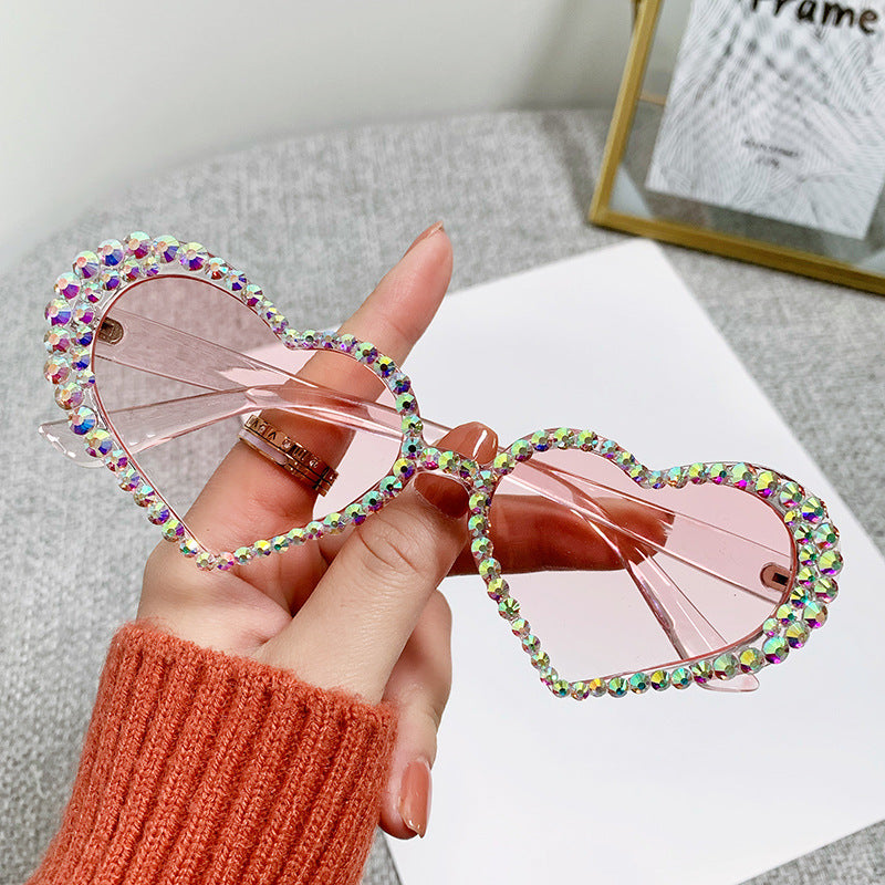 Women's fashion glasses 2023跨境爱心镶钻猫眼太阳镜桃心女士墨镜防紫外线手工钻石眼镜
