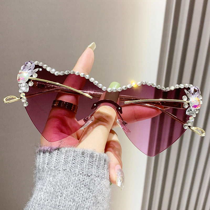 Women's fashion glasses 跨境新款爱心连体镜片无框镶钻猫眼太阳镜时尚女士墨镜桃心渐变色