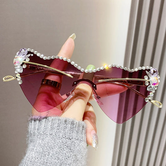 Women's fashion glasses 跨境新款爱心连体镜片无框镶钻猫眼太阳镜时尚女士墨镜桃心渐变色