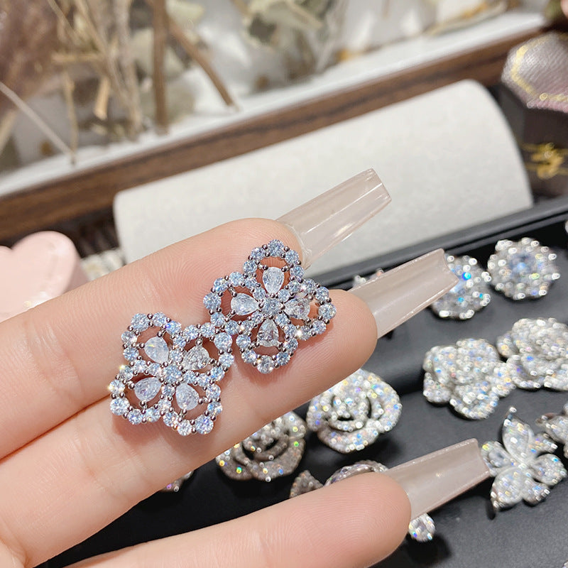 山茶直播货源热卖仿莫桑钻耳钉 镀18K金波光粼粼玫瑰花朵女神耳饰