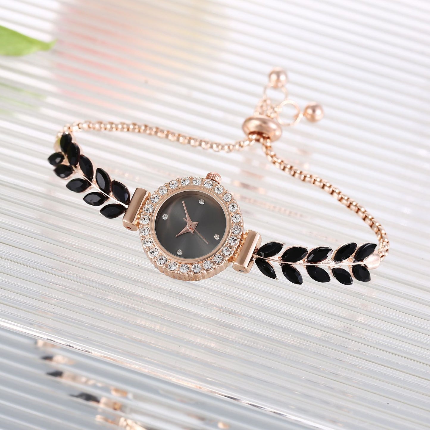 Fashion women's watch2023 New Wholesale Korean Fashion Green Leaf Diamond round Women's Watch Free Adjustment Bracelet Women's Watch