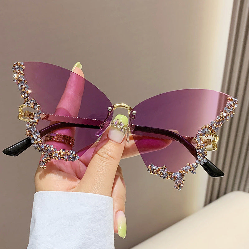 Women's fashion glasses 跨境2024新款蝴蝶形状镶钻无框太阳镜女时尚个性夸张墨镜欧美网红