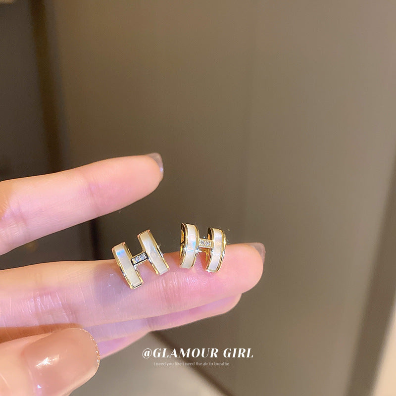 银针珍珠花朵耳环镶钻锆石轻奢韩国高级感耳钉个性爱心耳饰批发女