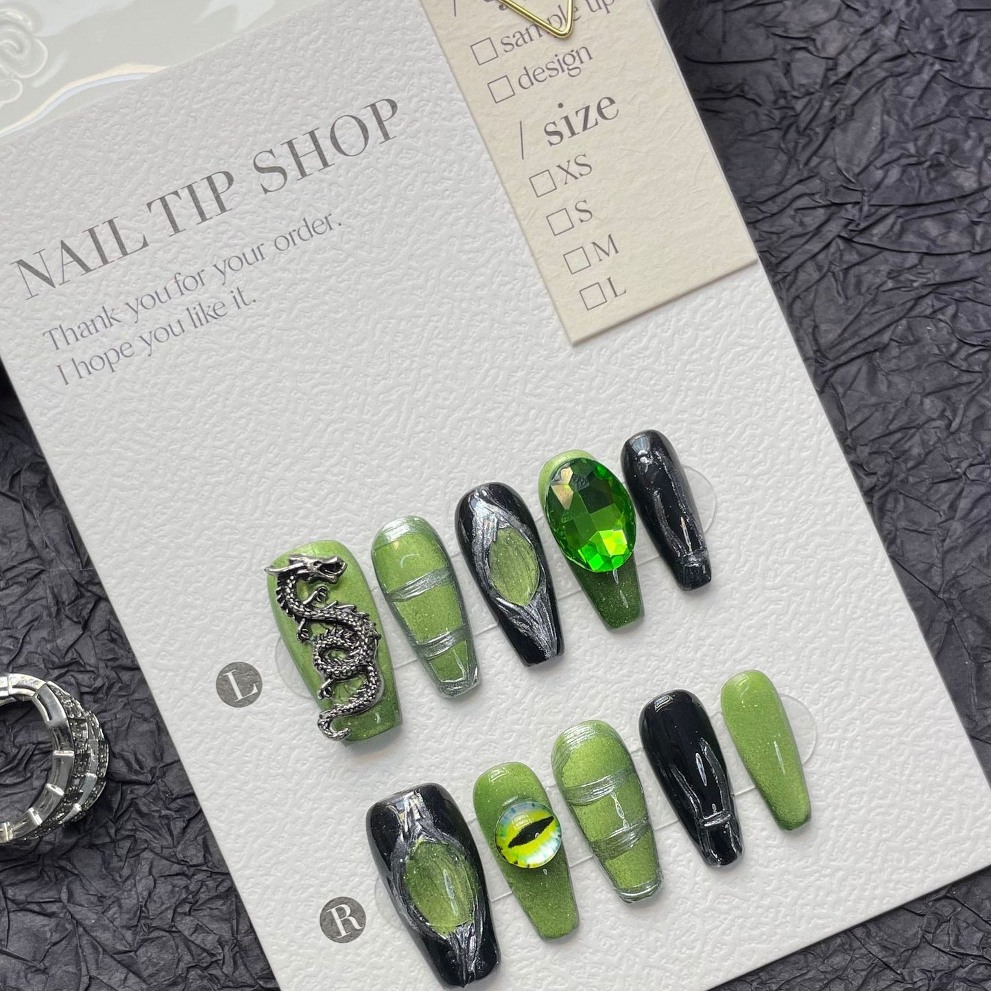(reusable nail)Black nail art, metal, high setting, wearing armor, autumn and winter high-end products, medium length, cool style, heavy industry, cyberpunk