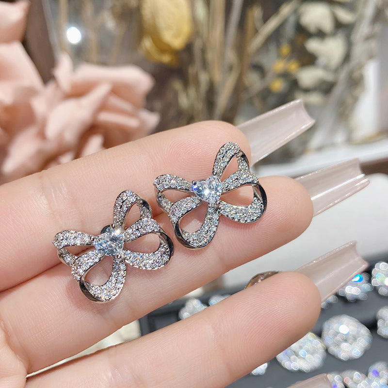 山茶直播货源热卖仿莫桑钻耳钉 镀18K金波光粼粼玫瑰花朵女神耳饰