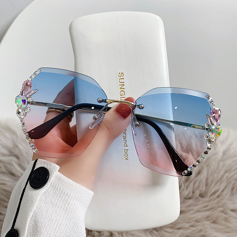 Women's fashion glasses 镶钻墨镜女款太阳镜跨境新款大脸显瘦防紫外线水晶切边无框太阳镜