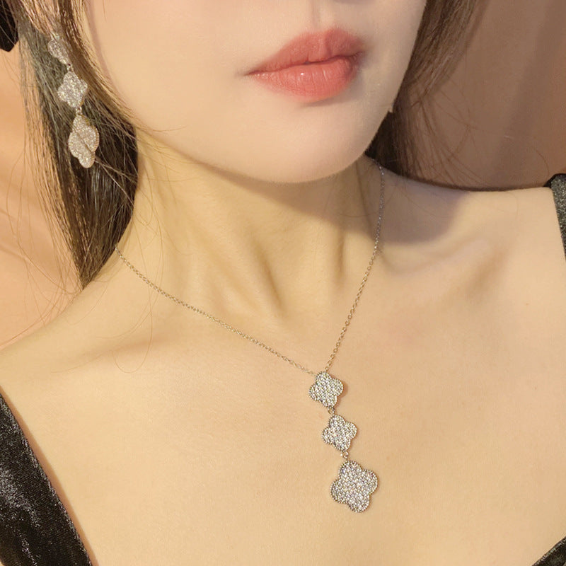 珠宝首饰山茶精工满钻奢华幸运四叶花套装 镀18K金璀璨流苏超仙不规则项链
