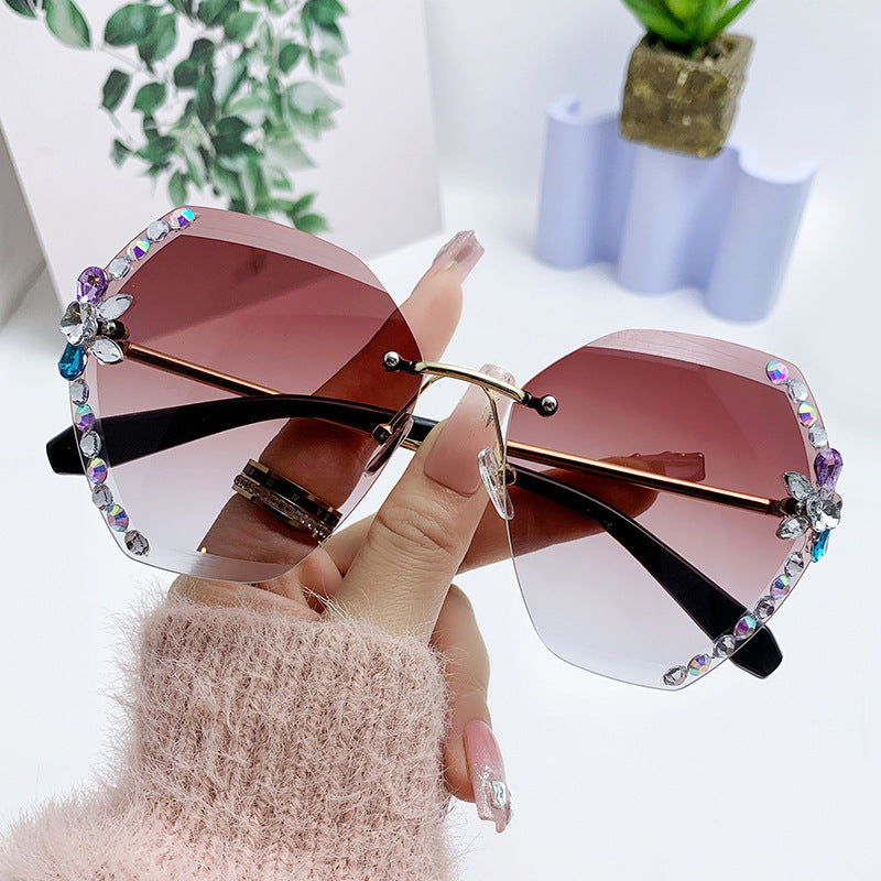 Women's fashion glasses 跨境新款水钻墨镜女显瘦无框切边太阳镜网红潮款防紫外线韩版眼镜