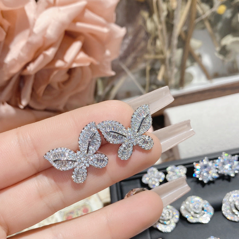 山茶直播货源热卖仿莫桑钻耳钉 镀18K金波光粼粼玫瑰花朵女神耳饰