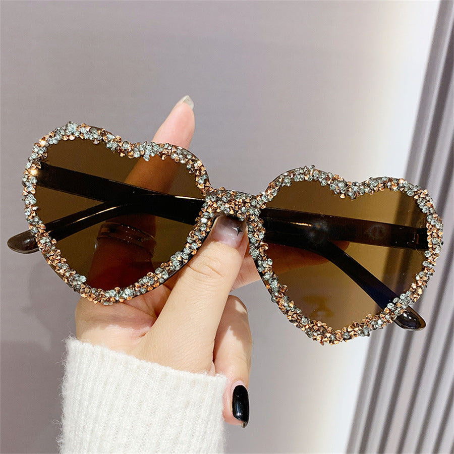 Women's fashion glasses 新款爱心连体镜片无框镶钻猫眼太阳镜跨境时尚女士墨镜桃心渐变色