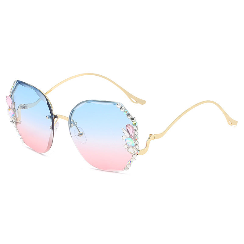 WWomen's fashion glasses 2024 跨境新款时尚镶钻无框切边太阳镜女潮款防紫外线显瘦太阳镜