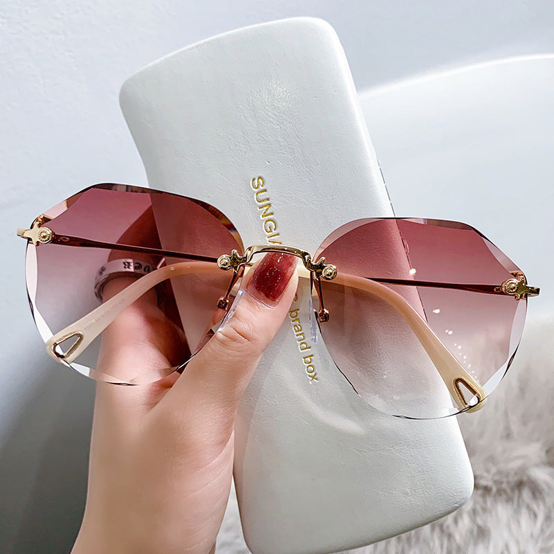 Women's fashion glasses年新款无框太阳眼镜女防紫外线高级感墨镜潮女圆脸大脸显瘦夏