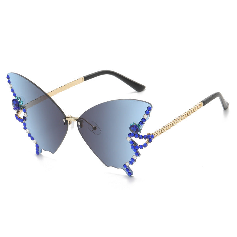 Women's fashion glasses 跨境2023新款蝴蝶形状镶钻无框太阳镜女时尚个性夸张墨镜欧美网红