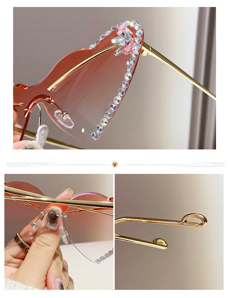 Women's fashion glasses 跨境新款爱心连体镜片无框镶钻猫眼太阳镜时尚女士墨镜桃心渐变色