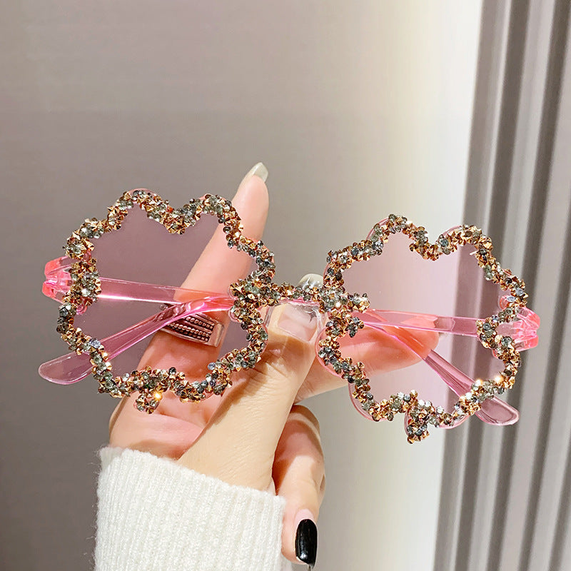 Women's fashion glasses 新款跨境镶钻透明果冻色四叶草太阳镜男女士墨镜欧形连体水钻眼镜