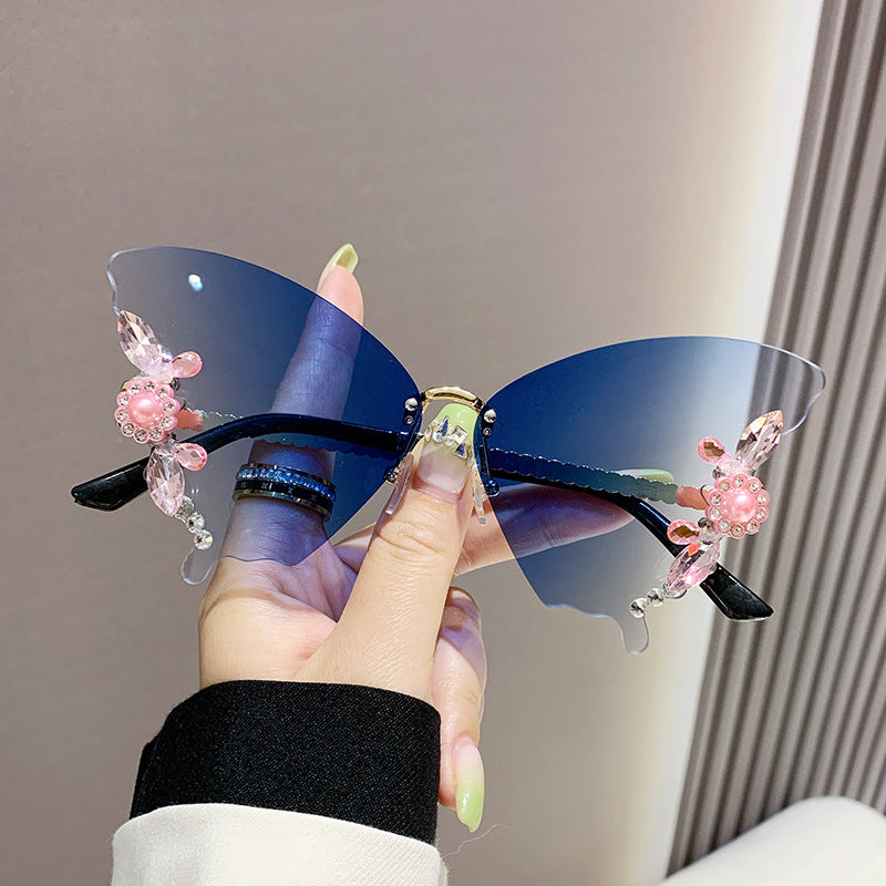 Women's fashion glasses 欧美跨境新款舞会蝴蝶形状镶钻无框太阳镜女夸张墨镜女圆脸大脸