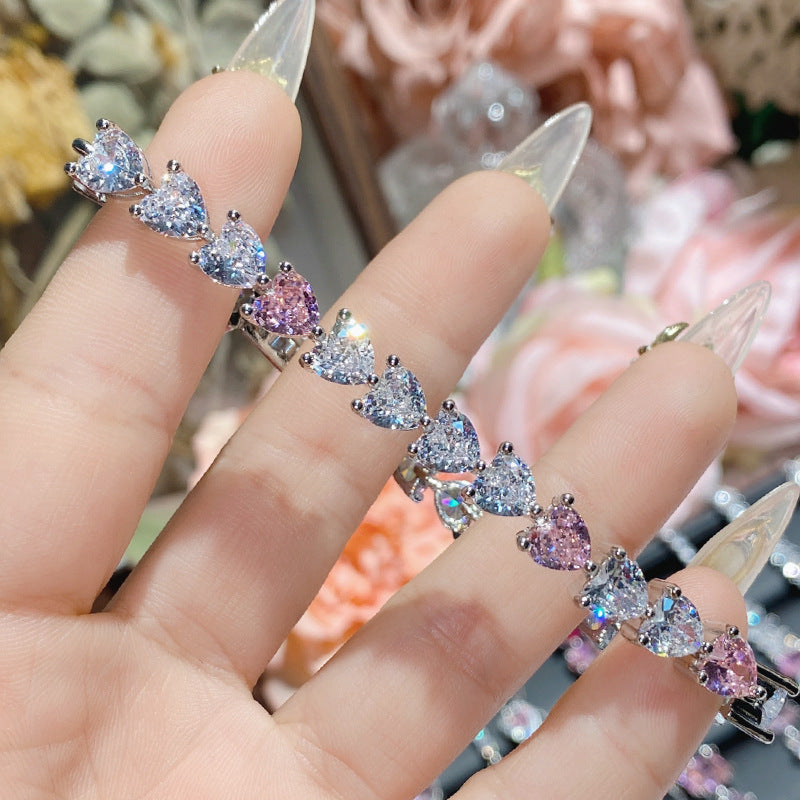珠宝首饰山茶怦然心动系列胭脂粉宝石手链女 镀18K多切面超闪桃心满钻手链
