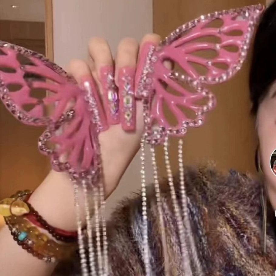 (Hand-made nail) Super-large and exaggerated butterflies wear nail art Camellia and turn around the butterfly chain in fake nails.