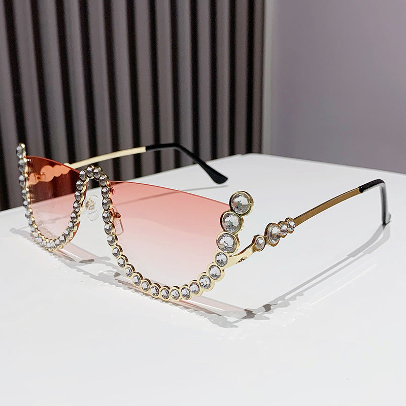 Women's fashion glasses 欧美镶钻大框架跨境水钻墨镜女异形波浪切边眼镜防晒显瘦太阳镜