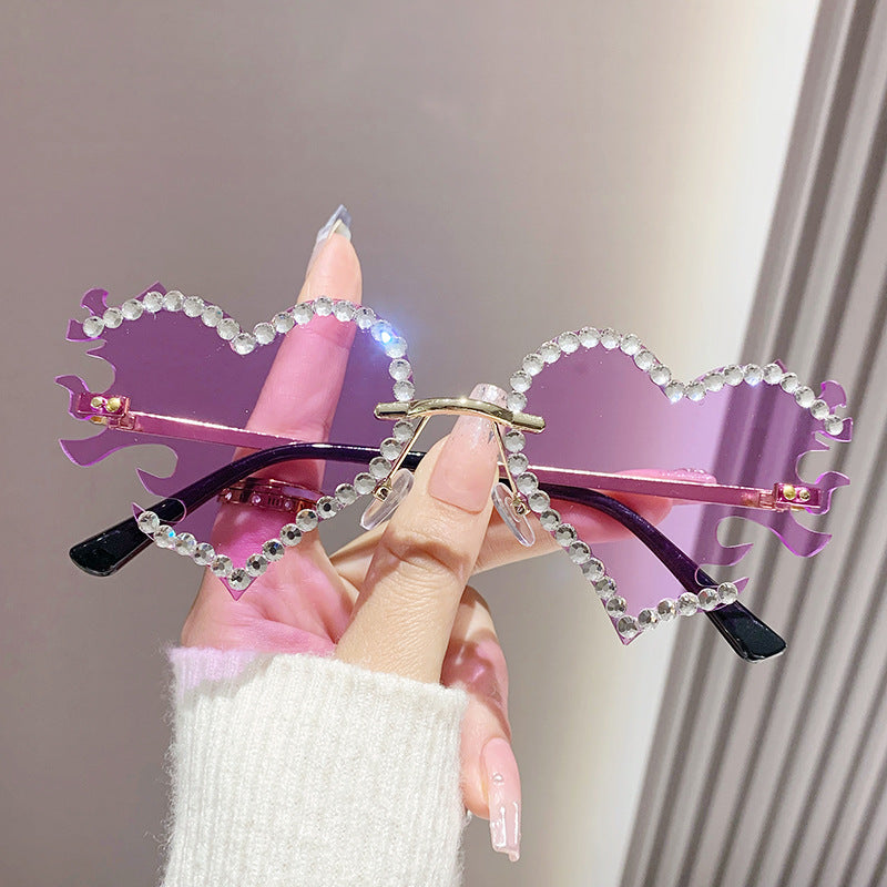 Women's fashion glasses 欧美墨镜太阳镜爱心个性街拍墨镜女无框时尚太阳眼镜批发